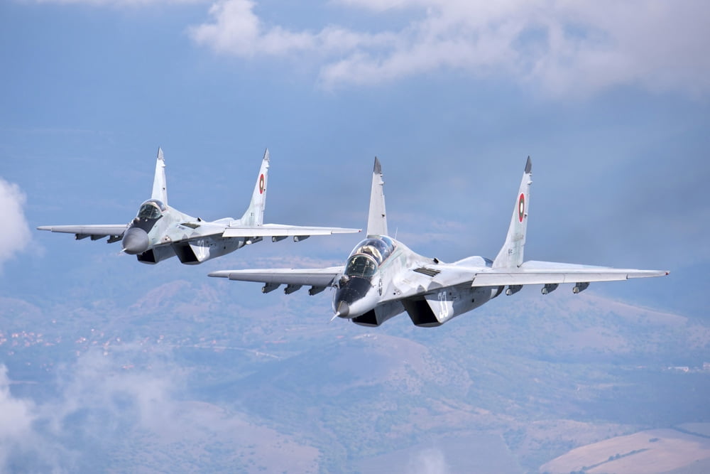 A pair of Bulgarian Air Force MiG-29s aircraft over Bulgaria Canvas Art - Daniele FaccioliStocktrek Images (17 x 12)