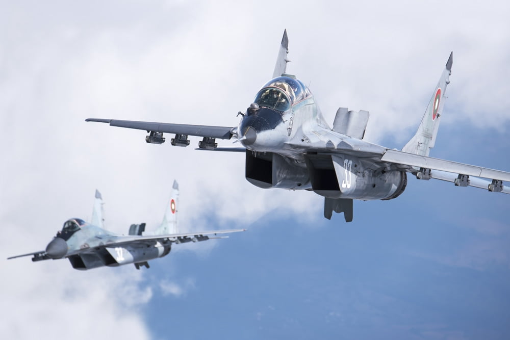 A pair of Bulgarian Air Force MiG-29s aircraft over Bulgaria Canvas Art - Daniele FaccioliStocktrek Images (17 x 12)