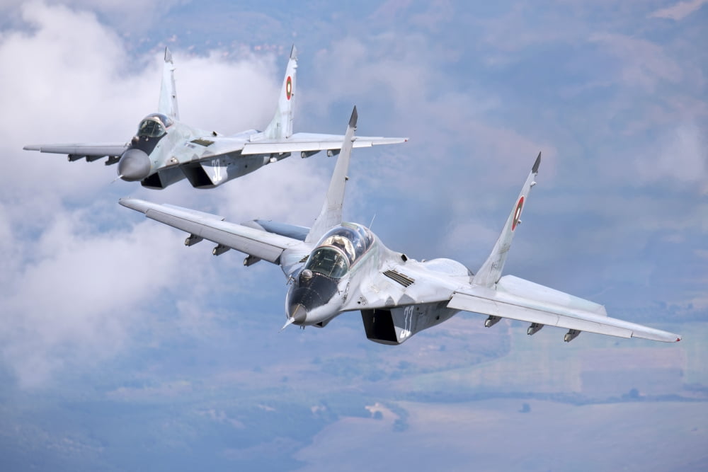 A pair of Bulgarian Air Force MiG-29s aircraft over Bulgaria Canvas Art - Daniele FaccioliStocktrek Images (34 x 23)