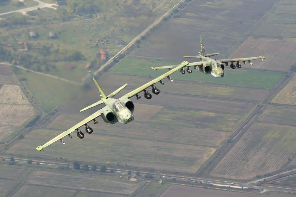 A pair of Bulgarian Air Force Sukhoi Su-25s flying over Bulgaria Canvas Art - Daniele FaccioliStocktrek Images (35 x 23)