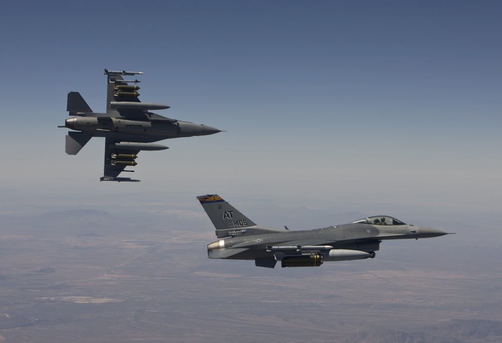 A pair of F-16s fly in formation over Arizona Canvas Art - HIGH-G ProductionsStocktrek Images (35 x 24)