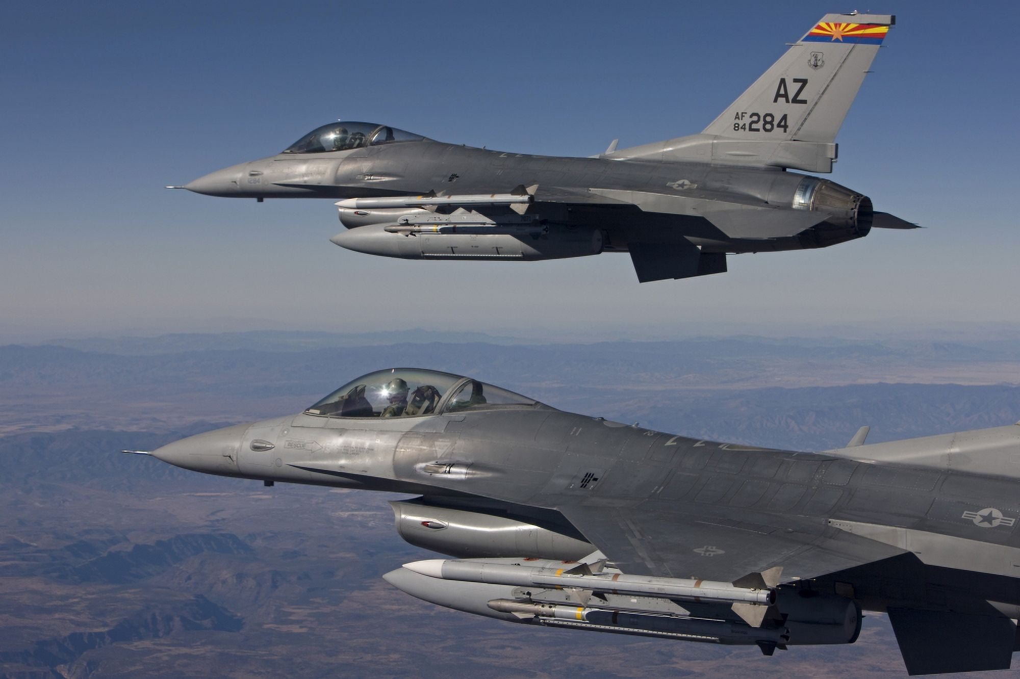 A pair of F-16s fly in formation over Arizona Canvas Art - HIGH-G ProductionsStocktrek Images (36 x 24)