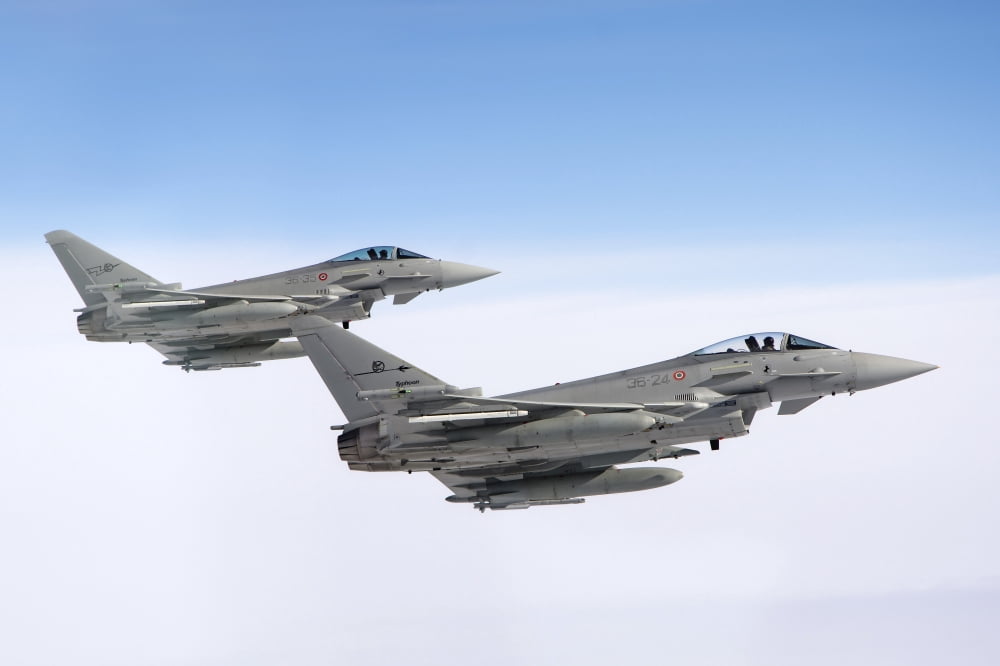 A pair of Italian Air Force F-2000A Typhoon aircraft Canvas Art - Daniele FaccioliStocktrek Images (34 x 23)
