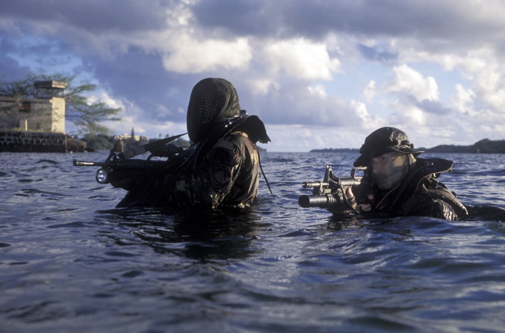 A pair of Navy SEAL combat swimmers transition from underwater to the surface Canvas Art - Michael WoodStocktrek Images (18 x 12)