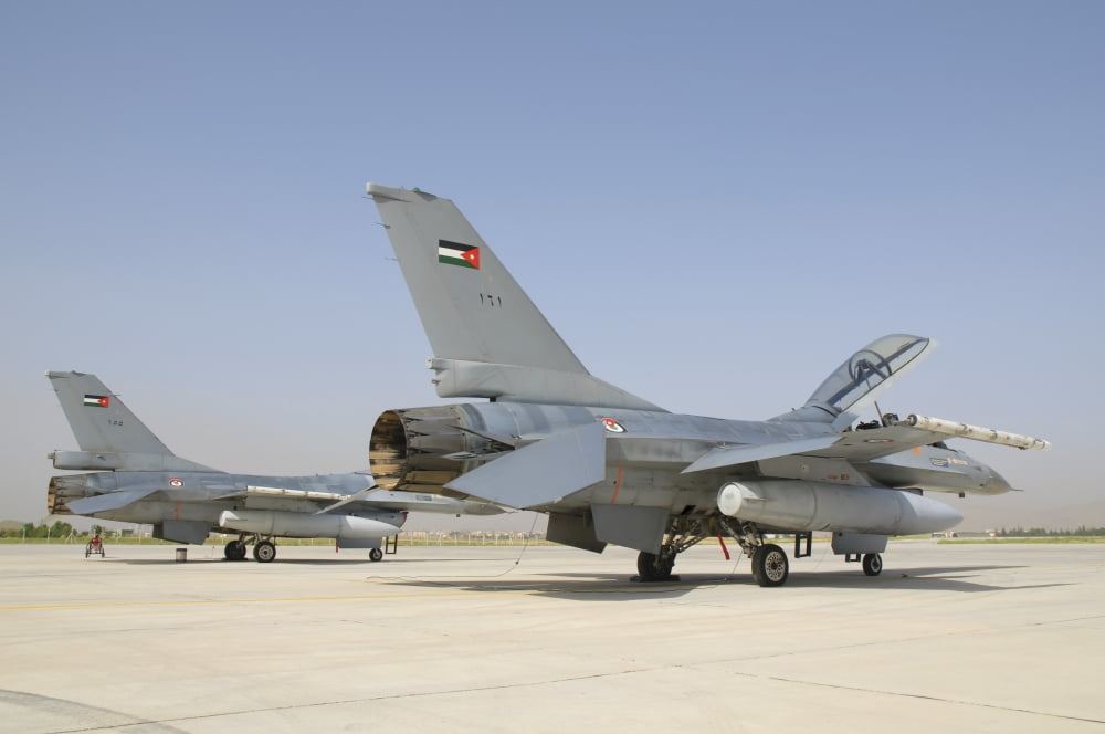 A pair of Royal Jordanian Air Force F-16s at Konya Air Base Canvas Art - Giovanni CollaStocktrek Images (35 x 23)