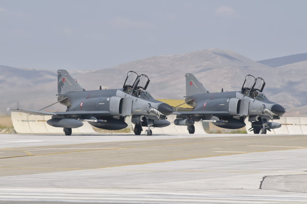 A pair of Turkish Air Force F-4 Phantom aircraft at Konya Air Base Turkey Canvas Art - Giovanni CollaStocktrek Images (17 x 12)