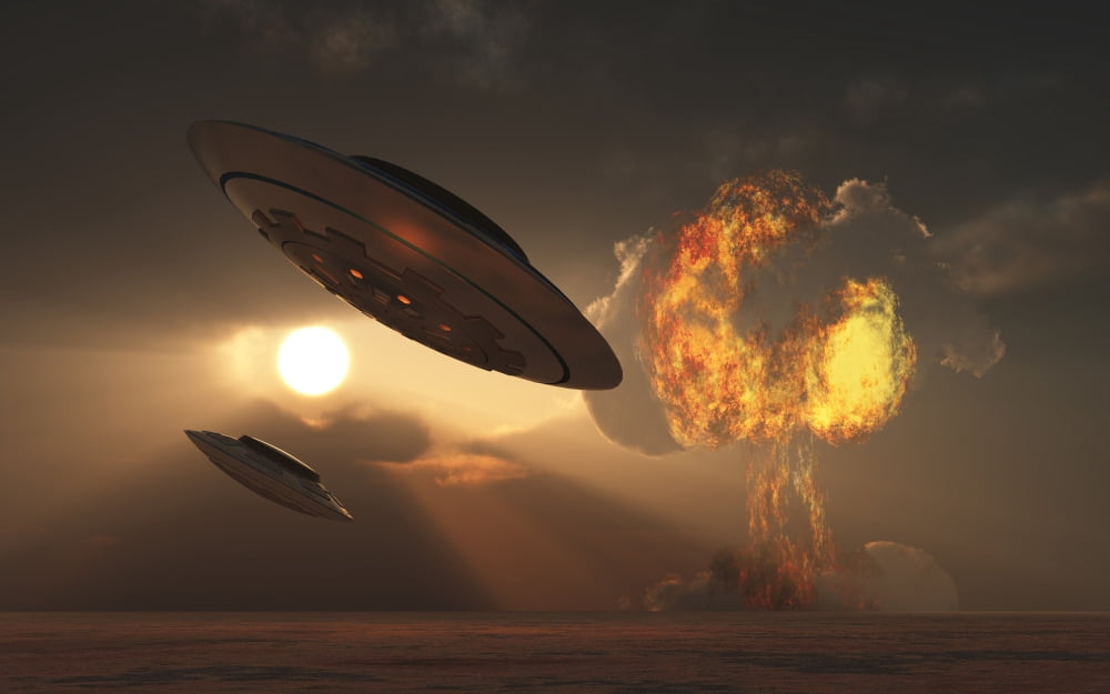 A pair of UFOs with a nuclear explosion in background Canvas Art - Mark StevensonStocktrek Images (36 x 23)