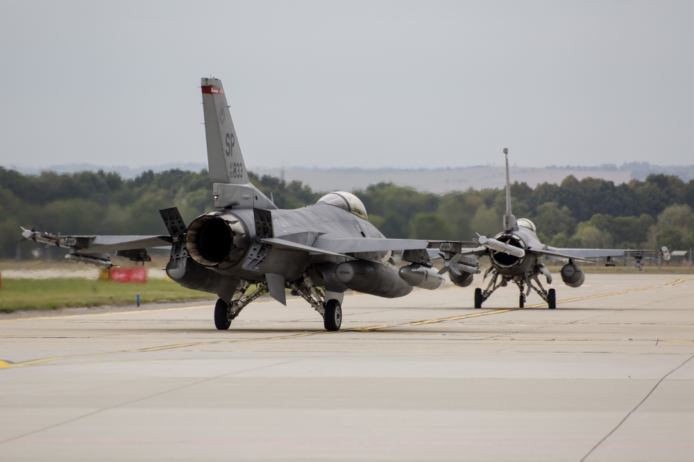 A pair of US Air Force F-16C Fighting Falcons taxiing on the runway Canvas Art - Timm ZiegenthalerStocktrek Images (34 x 23)
