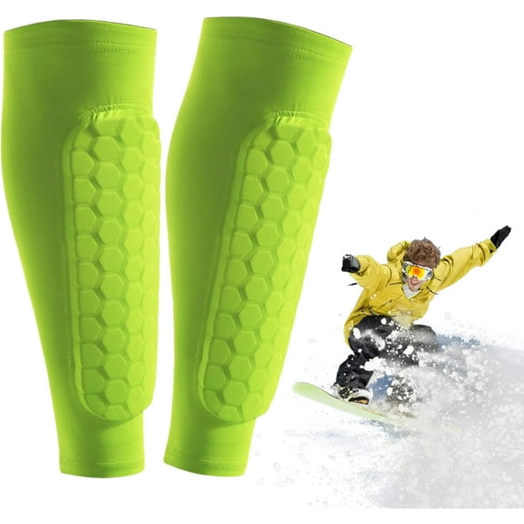 A pair of ski shin guards, suitable for adults and children, with honeycomb-padded compression sleeves to distribute pressure on ski boots.