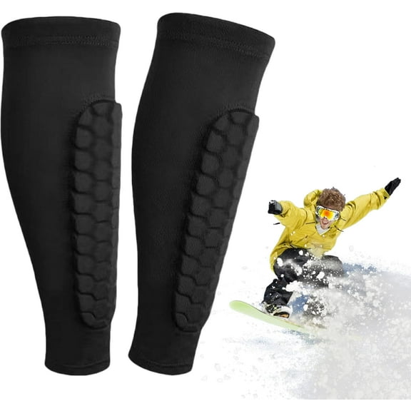 A pair of ski shin guards, suitable for adults and children, with honeycomb-padded compression sleeves to distribute pressure on ski boots.