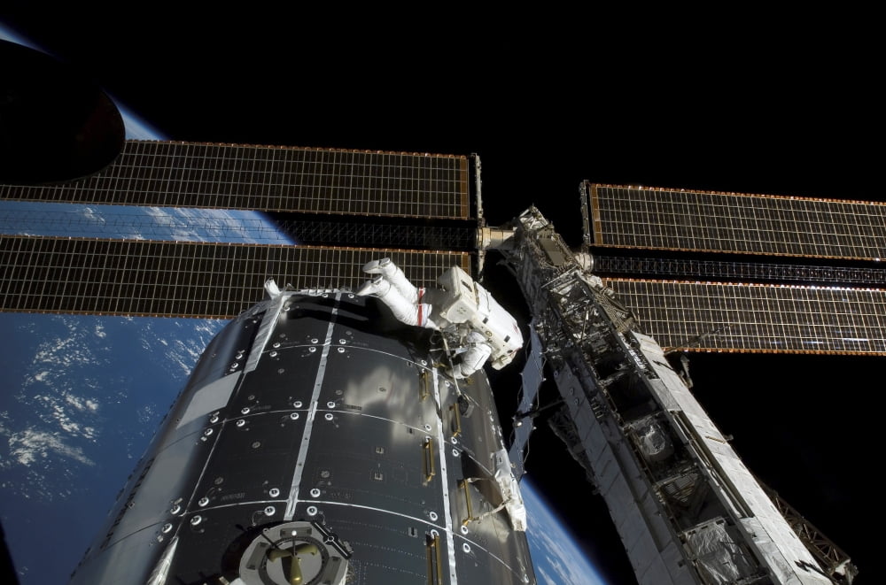 A panoramic view of the International Space Station Canvas Art - Stocktrek Images (34 x 23)