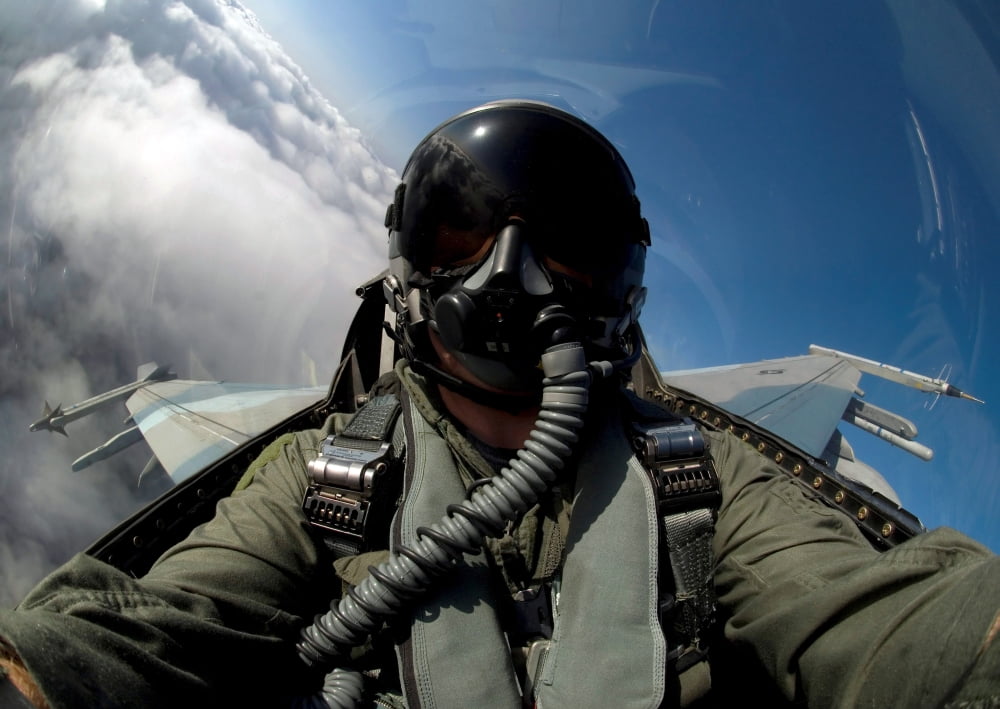 A pilot in the cockpit of an F-16 Fighting Falcon Canvas Art - Stocktrek Images (34 x 24)