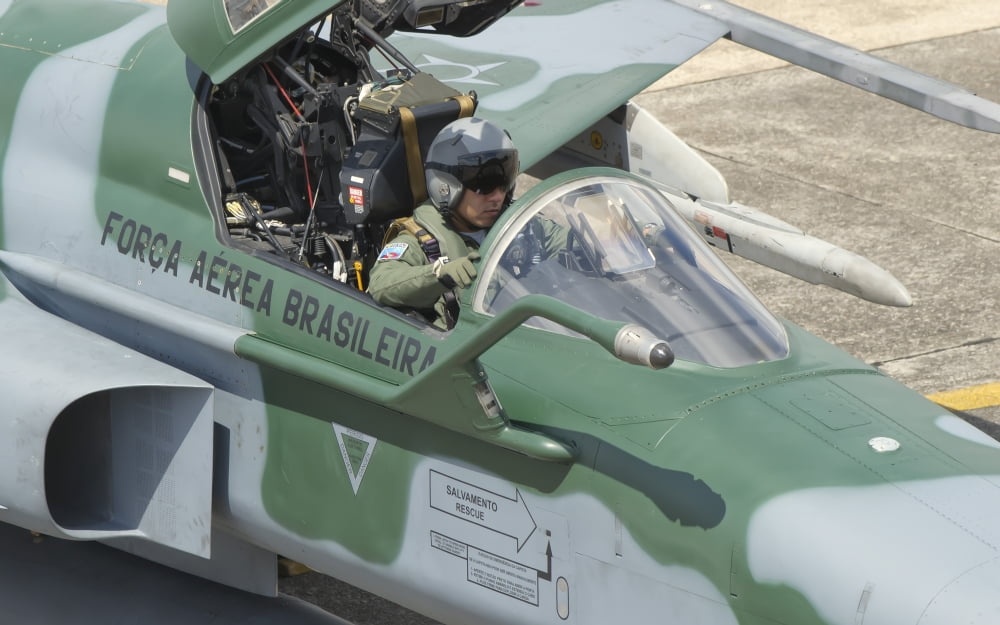 A pilot sitting in the cockpit of a Brazilian Air Force F-5 aircraft Canvas Art - Giovanni CollaStocktrek Images (18 x 12)