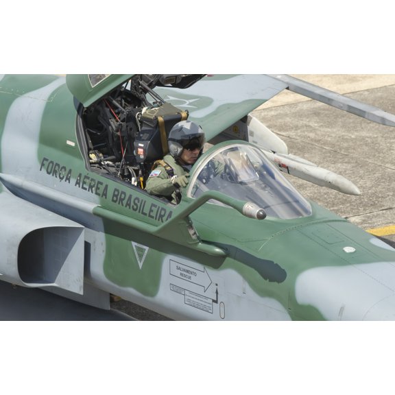 A pilot sitting in the cockpit of a Brazilian Air Force F-5 aircraft Canvas Art - Giovanni CollaStocktrek Images (18 x 12)