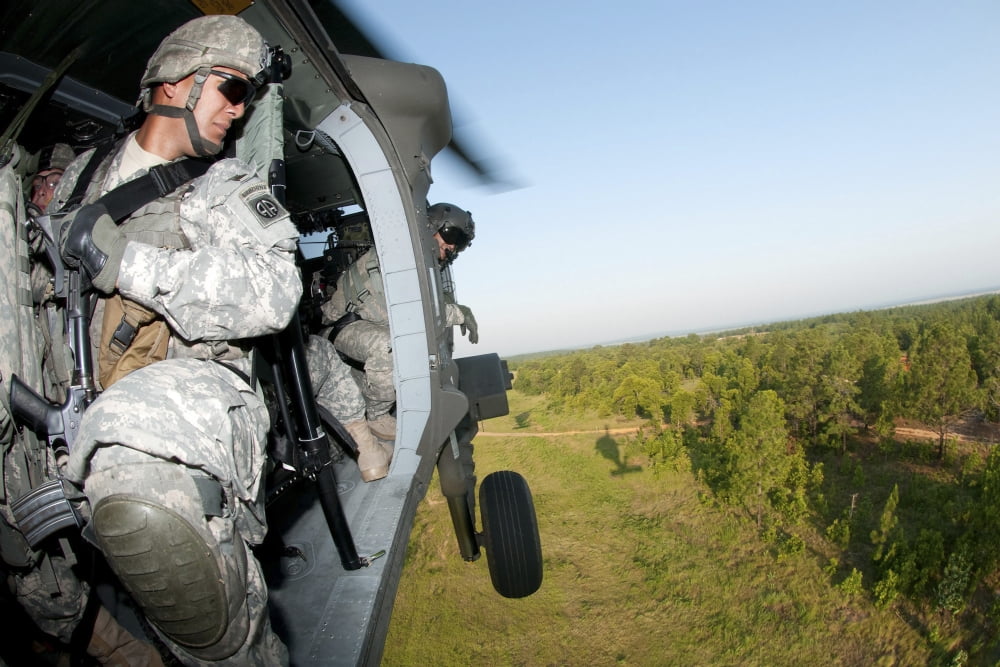 A platoon sergeant prepares to land during air assault training at Fort Bragg North Carolina Canvas Art - Stocktrek Images (35 x 23)