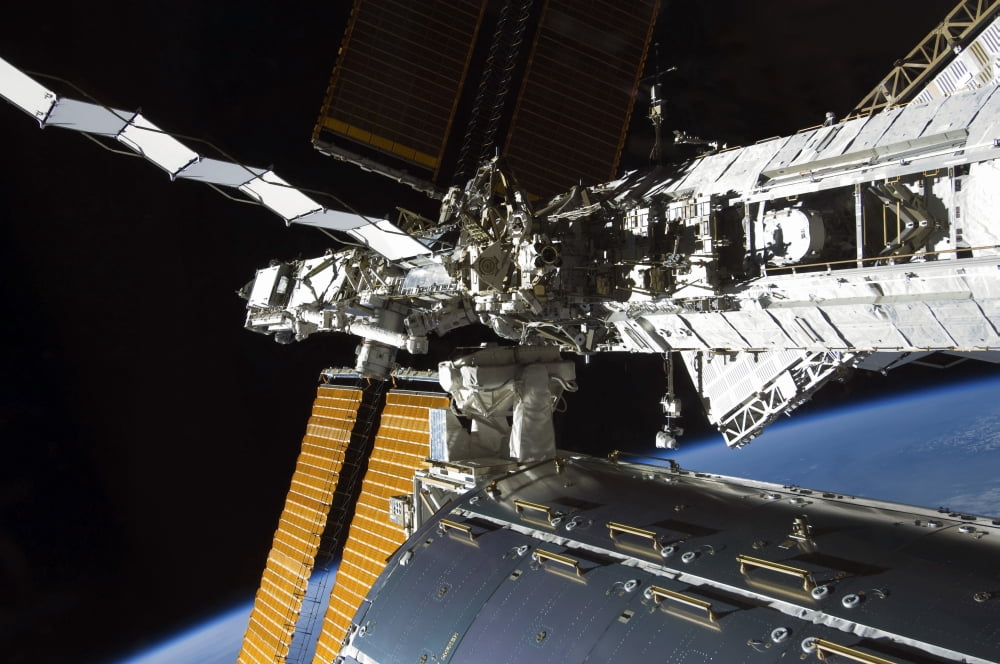A portion of the Columbus laboratory starboard truss and solar array panels Canvas Art - Stocktrek Images (35 x 23)