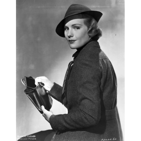 A portrait of Frances Farmer with a leather handbag Photo Print (24 x 30)