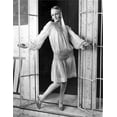 thumbnail image 1 of A portrait of Twiggy in a doorway Photo Print (24 x 30), 1 of 1