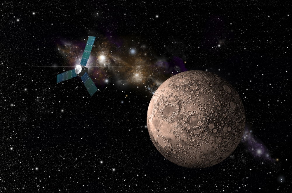 A probe investigating a heavily cratered moon in deep space Canvas Art - Marc WardStocktrek Images (18 x 12)