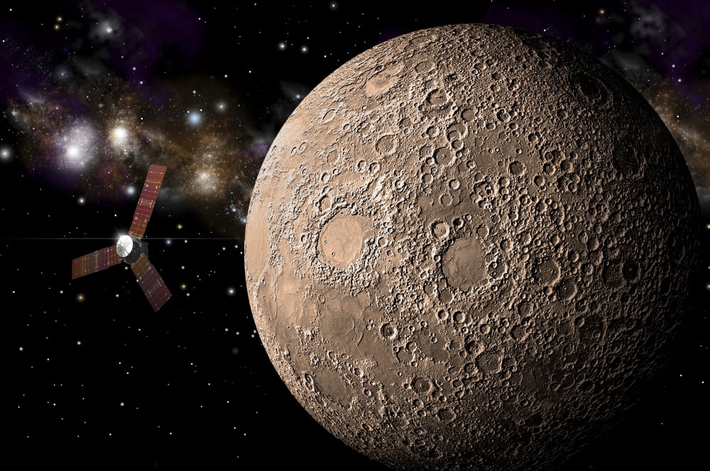 A probe investigating a heavily cratered moon in deep space Canvas Art - Marc WardStocktrek Images (18 x 12)