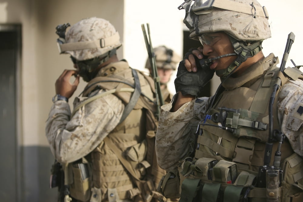 A radio operator helps a platoon commander get radio confirmation Canvas Art - Stocktrek Images (34 x 23)
