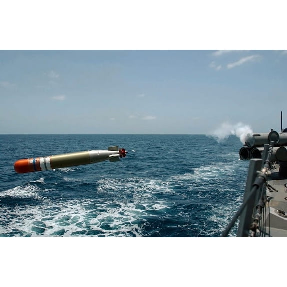 A recoverable MK-46 Exercise Torpedo is launched from the Guided Missile Destroyer USS Donald Cook Poster Print by Stocktrek Images (17 x 11)