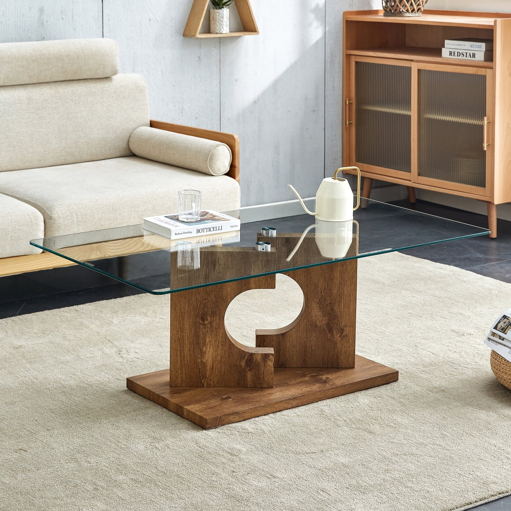 A rectangular modern and fashionable coffee table with tempered glass ...