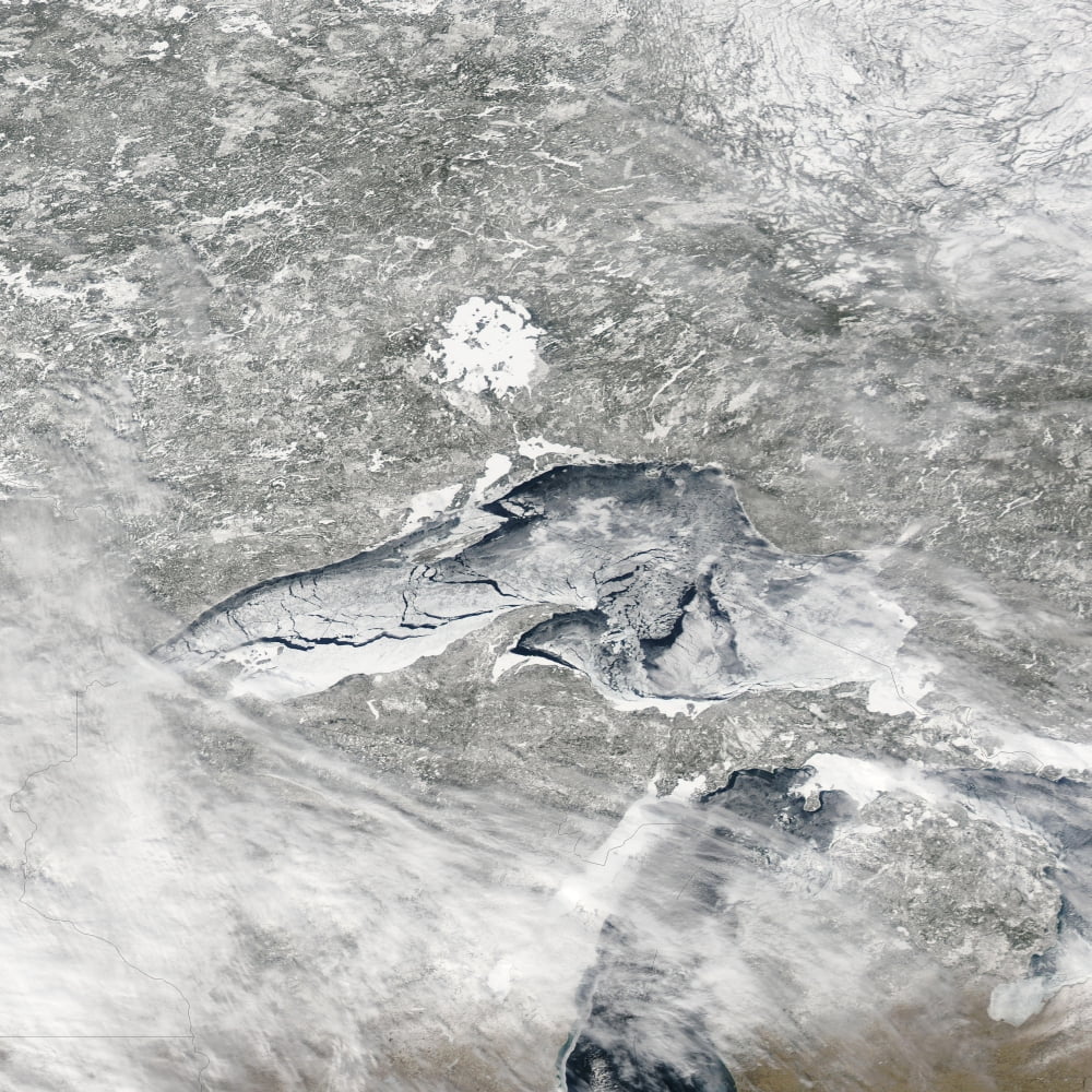 A relatively rare blanket of ice rests on the surface of Lake Superior Canvas Art - Stocktrek Images (29 x 29)