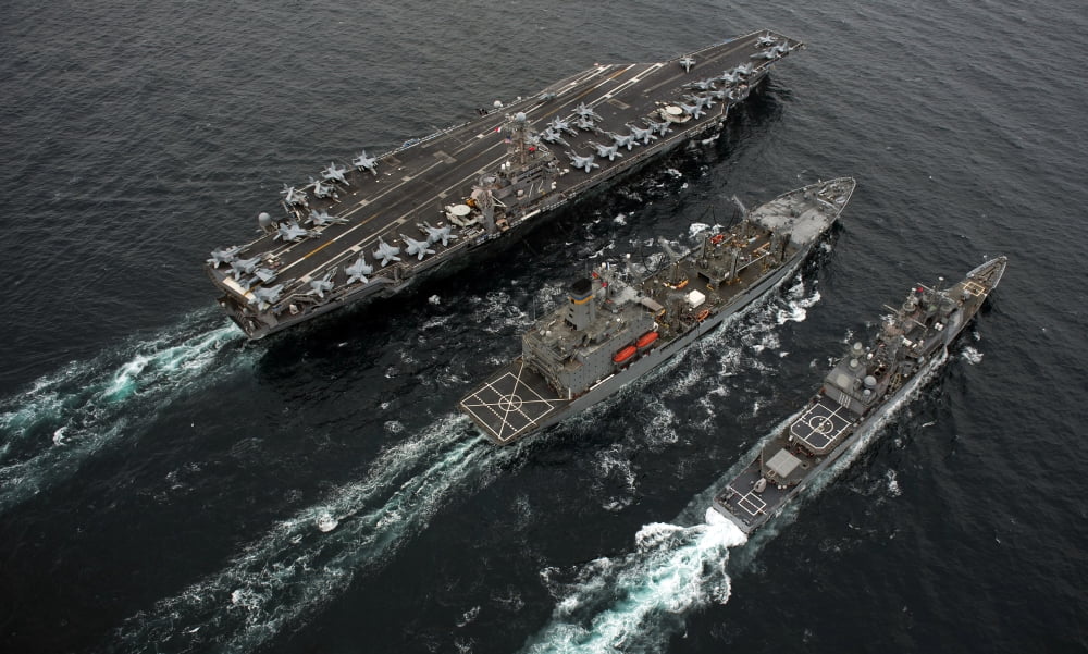 A replenishment at sea between USS Abraham Lincoln USNS Guadalupe and USS Cape St George Canvas Art - Stocktrek Images (36 x 22)
