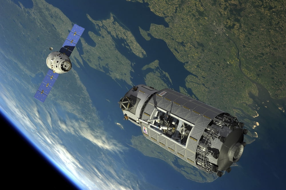 A reusable crew capsule prepares to dock with an orbital maintenance platform Canvas Art - Walter MyersStocktrek Images (35 x 24)