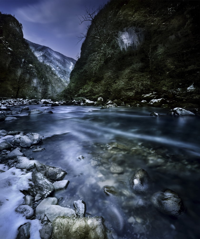 A river flowing through the snowy mountains of Ritsa Nature Reserve Canvas Art - Evgeny KuklevStocktrek Images (13 x 16)