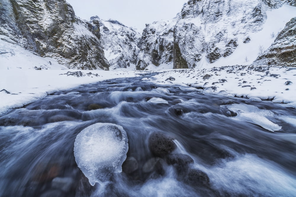 A river flows out of the mountains in the area known as Thorsmork Southern Iceland Iceland Canvas Art - Robert Postma Design Pics (19 x 12)