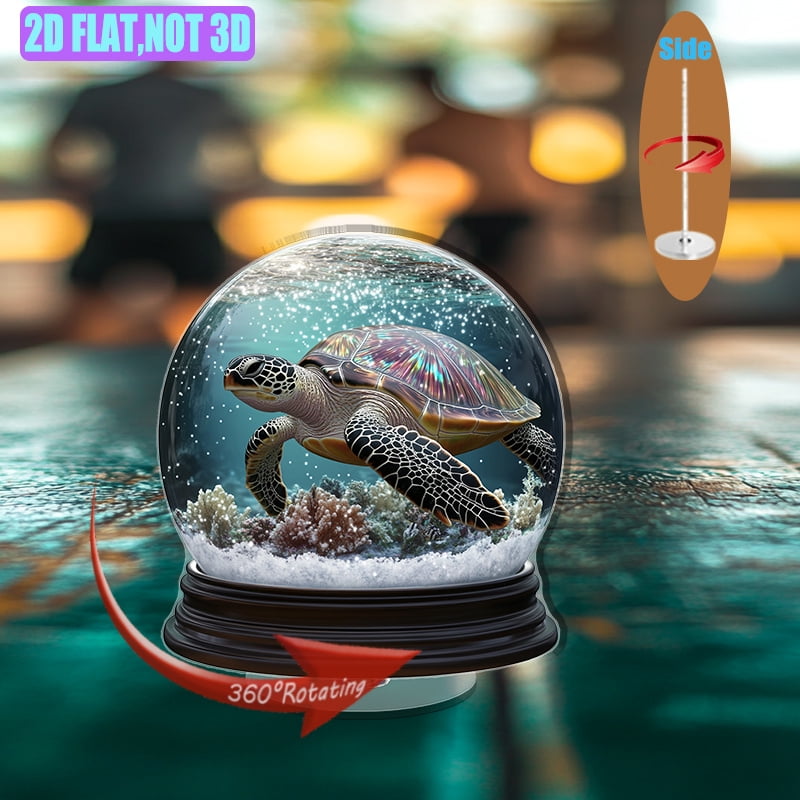 A rotating acrylic ornament featuring an iridescent sea turtle in a ...