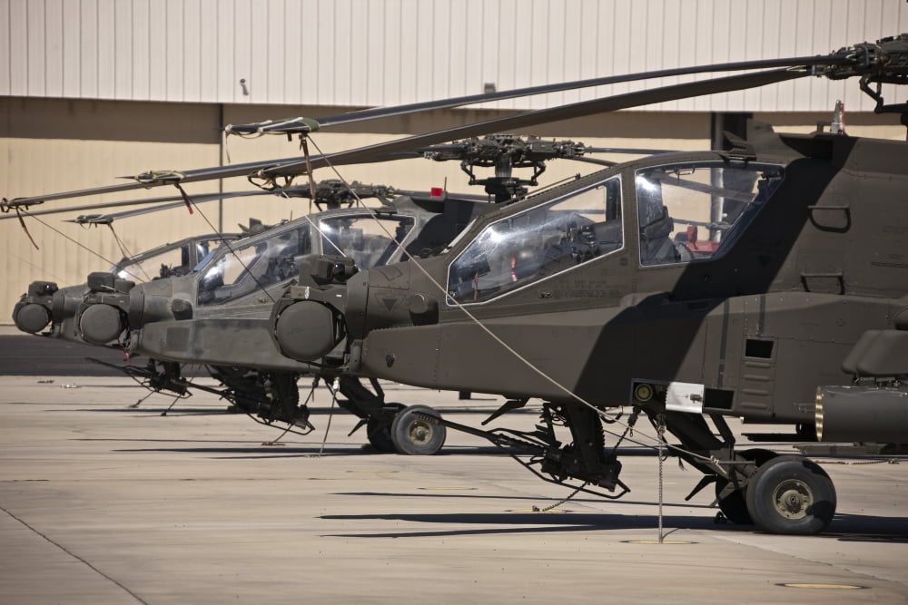 A row of AH-64D Apache Longbow helicopters Canvas Art - Terry MooreStocktrek Images (35 x 23)
