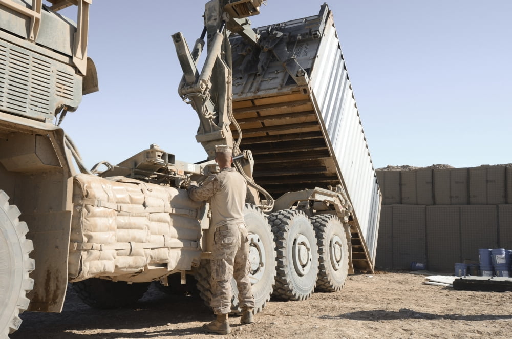 A shipping container is off-loaded from a logistics vehicle system Canvas Art - Stocktrek Images (35 x 23)