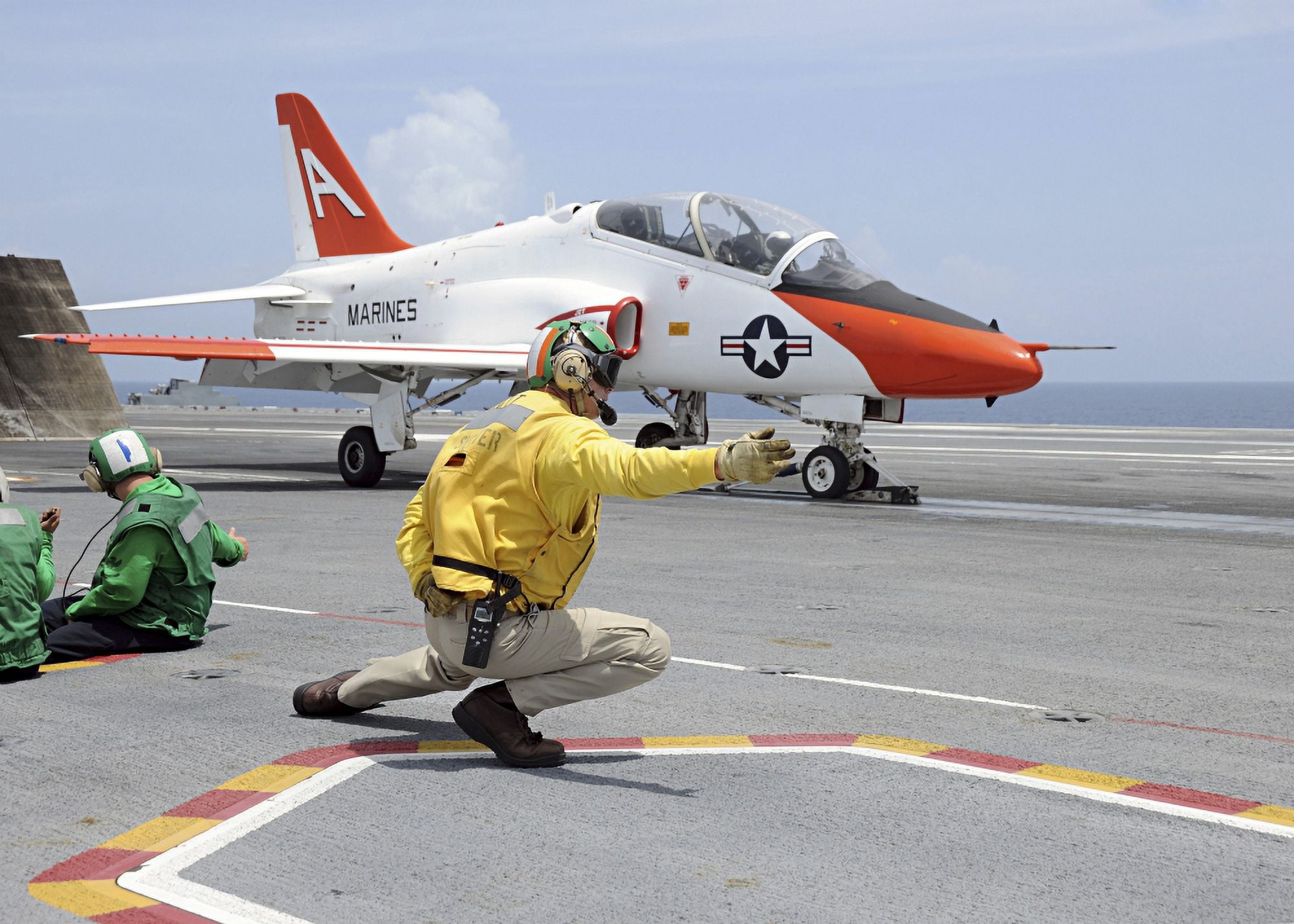 A shooter aboard the aircraft carrier USS George HW Bush launches a T-45C Goshawk training aircraft Canvas Art - Stocktrek Images (33 x 24)