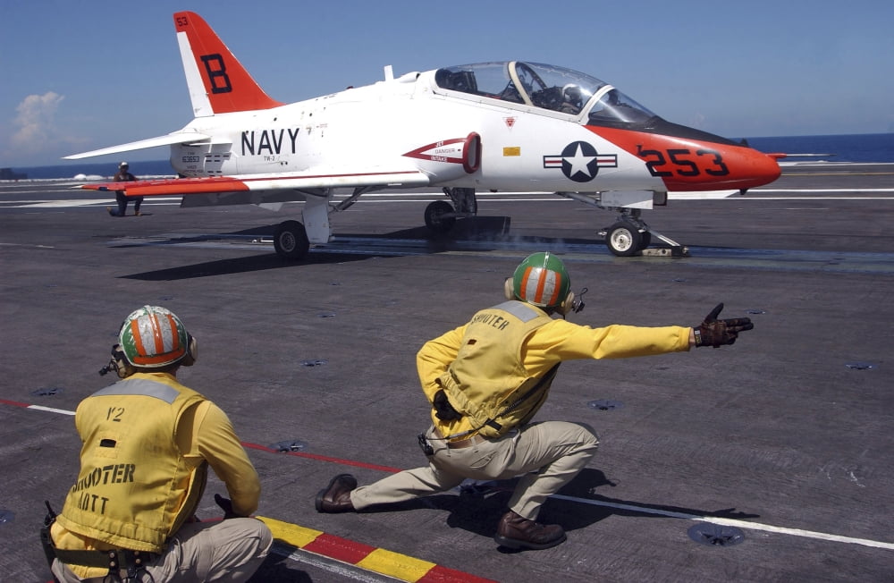 A shooter signlas the launch of a T-45A Goshawk trainer aircraft Canvas Art - Stocktrek Images (35 x 23)