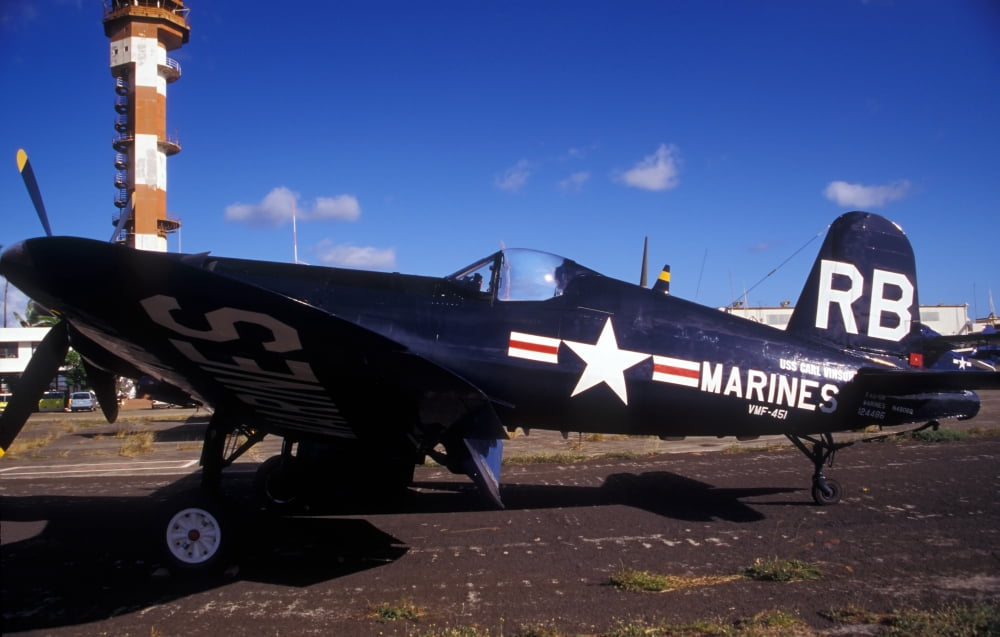 A side view of a US Marine Corps F4U Corsair World War II aircraft Canvas Art - Michael WoodStocktrek Images (18 x 11)