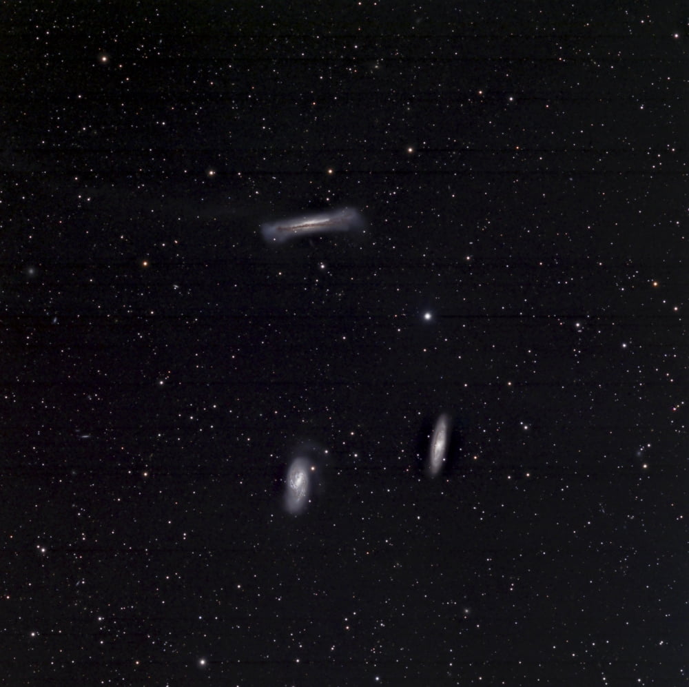 A small group of galaxies known as the Leo Triplet Canvas Art - Phillip JonesStocktrek Images (28 x 28)