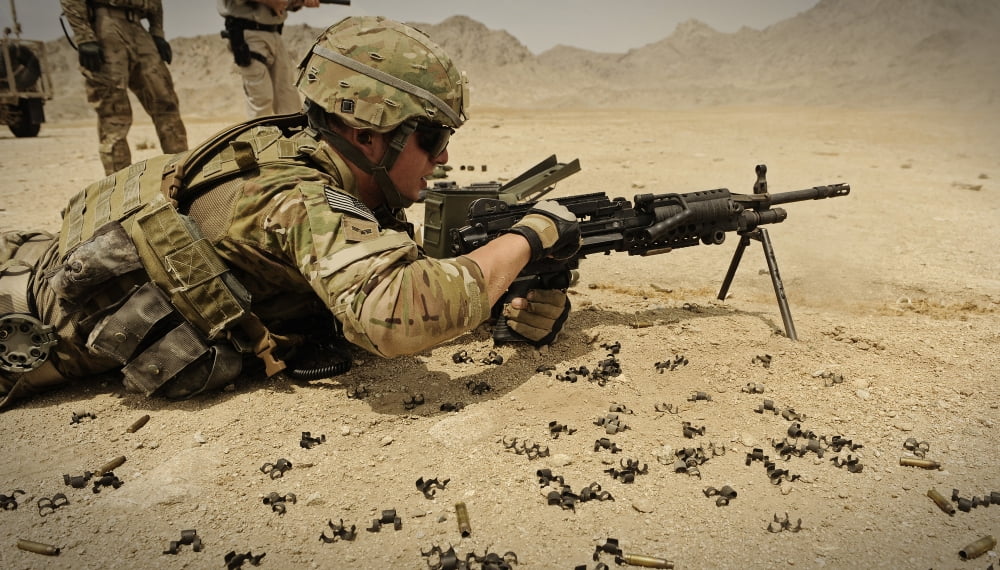 A soldier clears the Mk-48 machine gun on the firing range Canvas Art - Stocktrek Images (37 x 21)