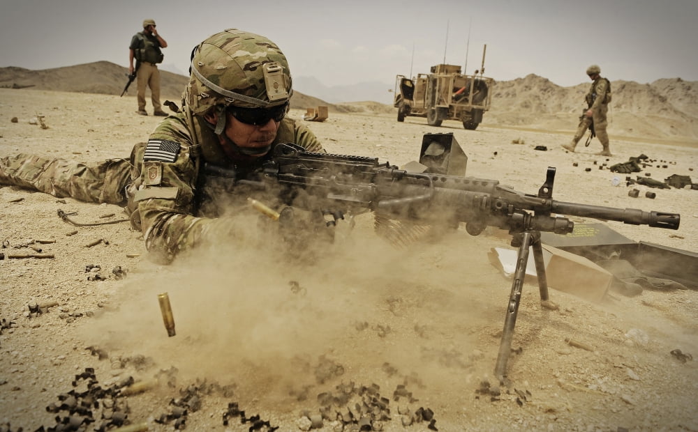 A soldier firing his MK-48 machine gun Canvas Art - Stocktrek Images (36 x 22)