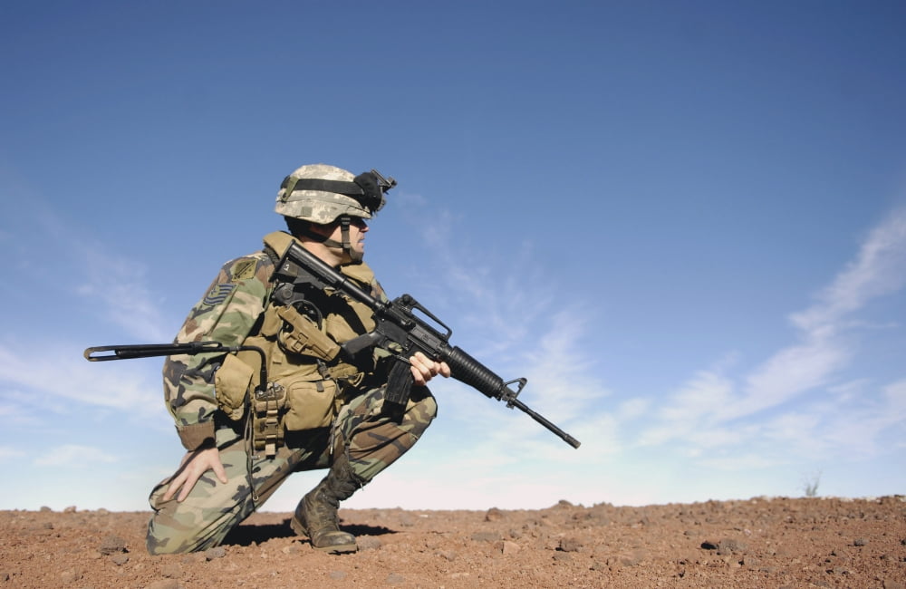 A soldier gives instructions on setting up and securing an evacuation landing zone Canvas Art - Stocktrek Images (35 x 23)
