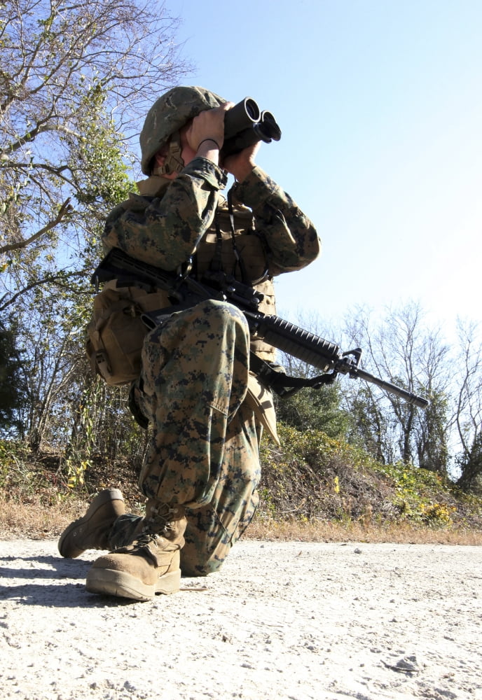 A soldier looking through binoculars for improvised explosive devices Canvas Art - Stocktrek Images (24 x 34)