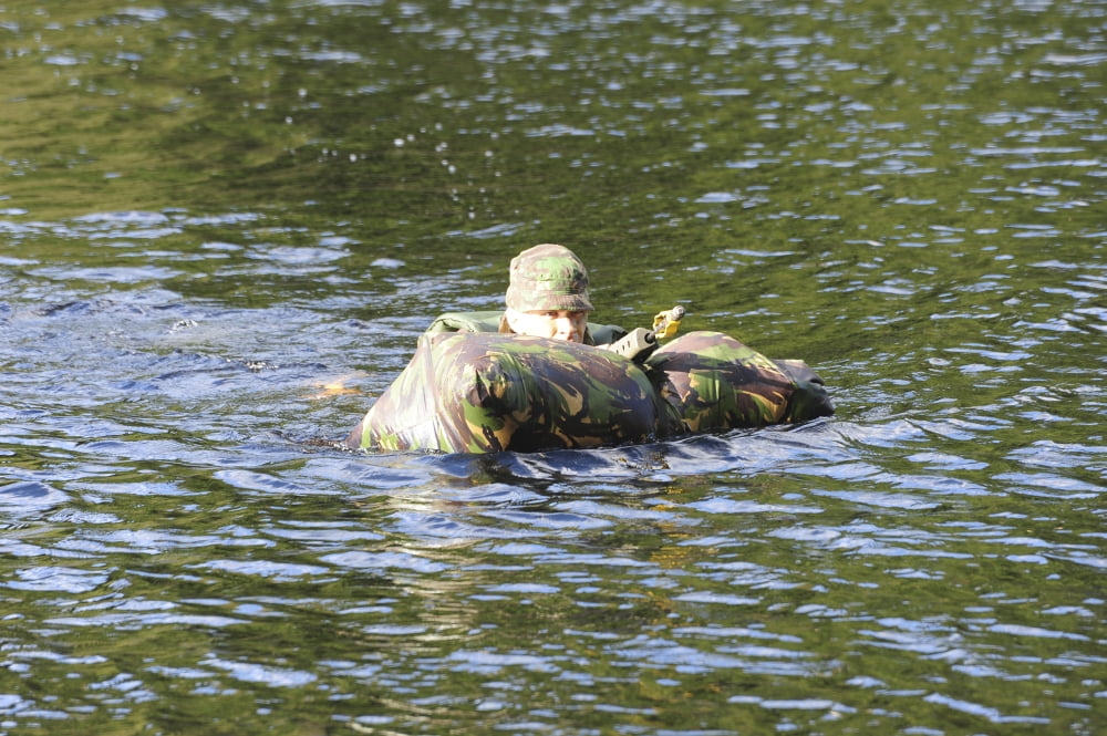 A soldier participates in a river crossing during Exercise Cambrian Patrol Canvas Art - Andrew ChittockStocktrek Images (35 x 24)