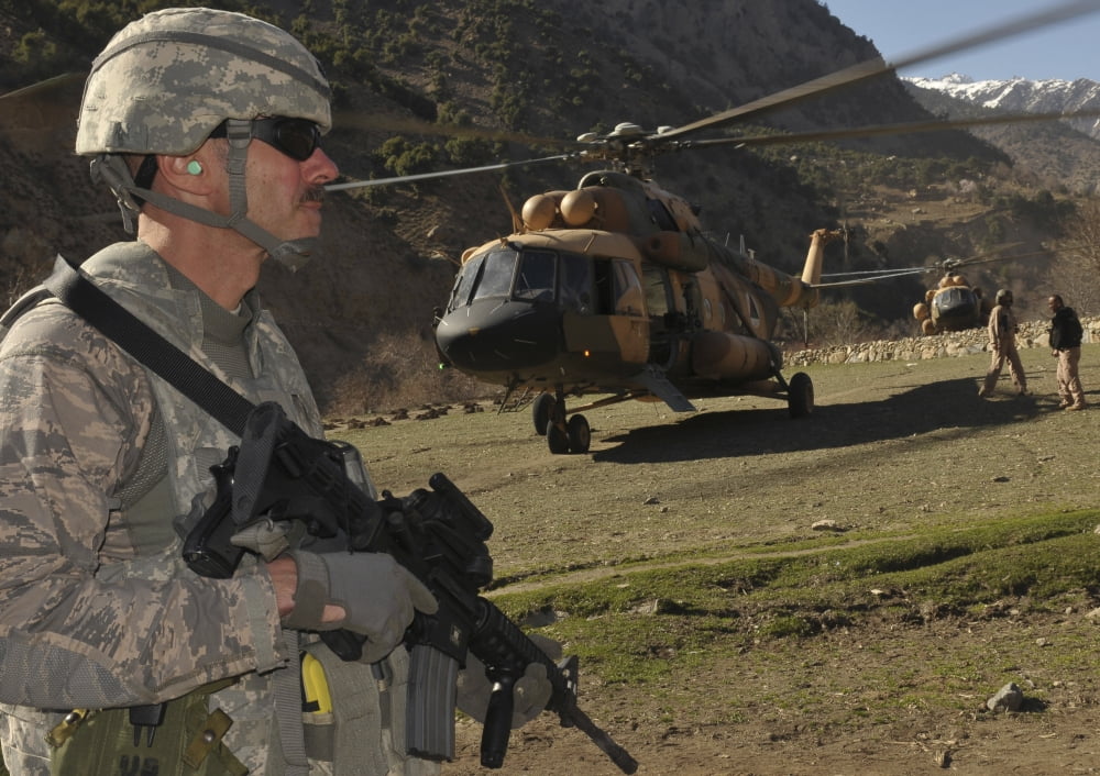 A soldier provides security during a combat resupply mission in Afghanistan Canvas Art - Stocktrek Images (34 x 24)