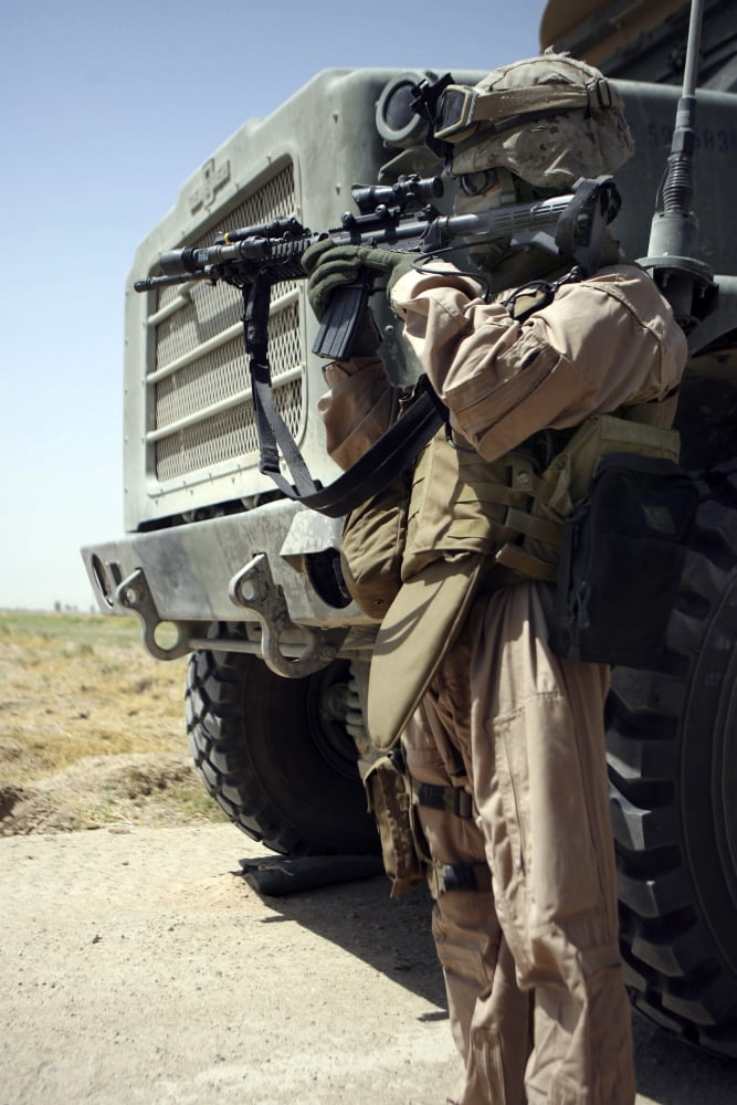 A soldier provides security for Marines Canvas Art - Stocktrek Images (23 x 34)