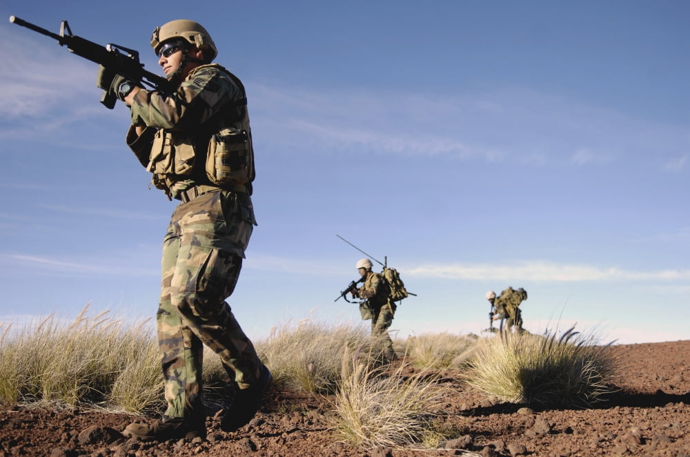 A soldier takes point while training his Airmen on patrol tactics Canvas Art - Stocktrek Images (34 x 23)