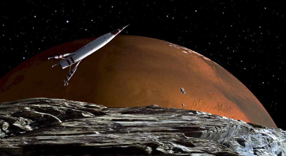 A spaceship in orbit over Mars moon Phobos with the red planet Mars in the background Canvas Art - Frank HettickStocktrek Images (39 x 21)
