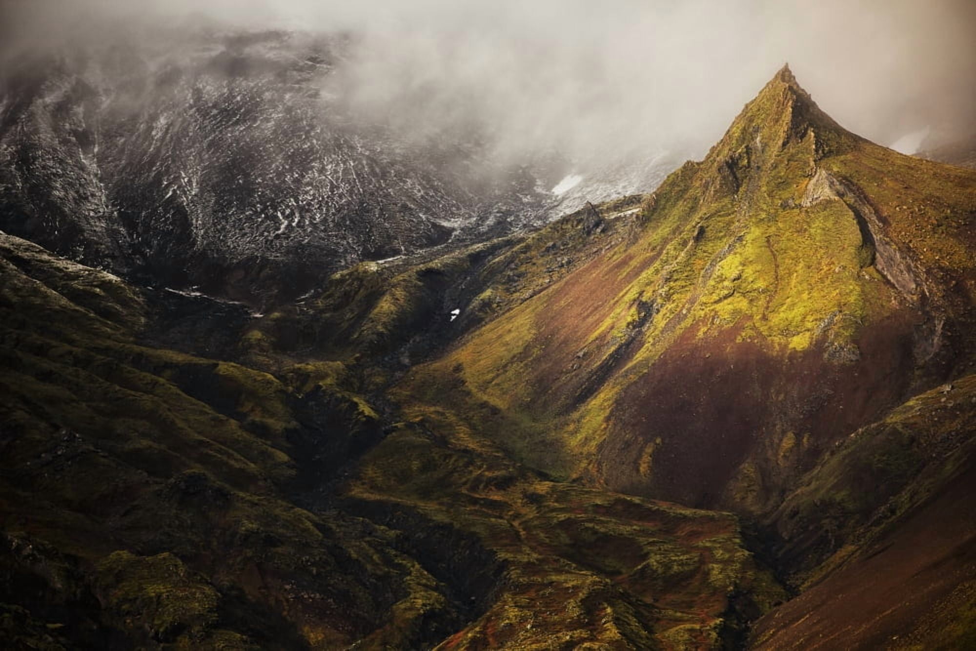 A spire of rock rises from the flanks of the volcano on the Snaefellsness Peninsula Iceland Canvas Art - Robert Postma Design Pics (19 x 12)