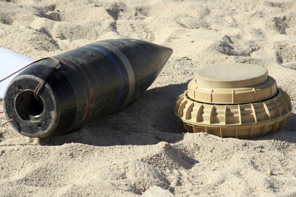 A static display of a converted ordnance shell and a simple mine Canvas Art - Stocktrek Images (34 x 23)